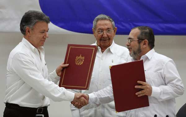 Colombia Government, FARC rebels sign historic ceasefire and disarmament agreement
